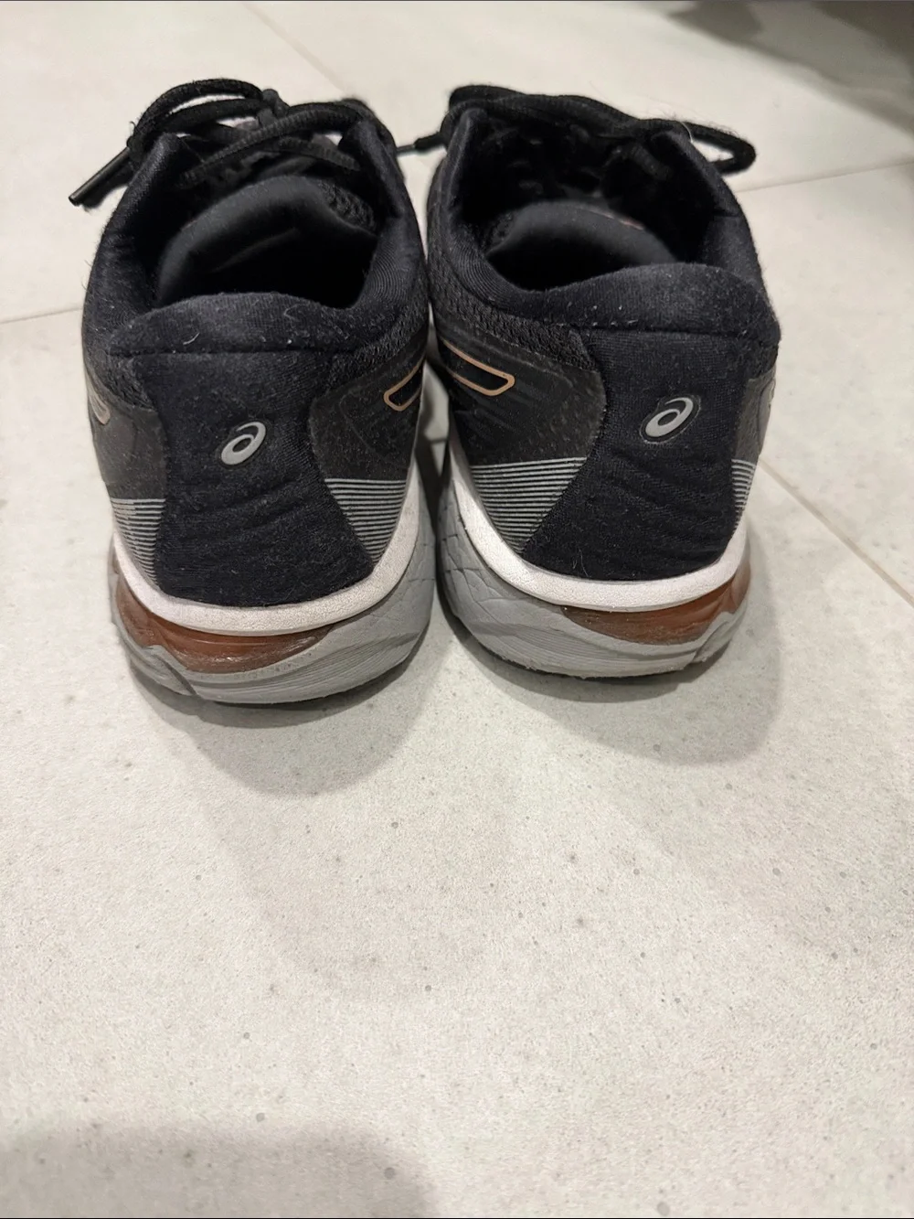 Asics Black Sneakers with Copper Accents